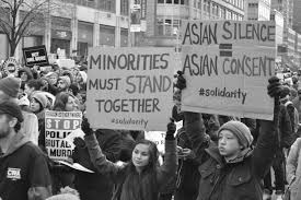 Asian American protestors gather to speak against the spike of hostility against them (https://commons.wikimedia.org/wiki/File:Asian_American_protestors.jpg).
